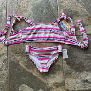 Girls swimsuit. New with tags.  UV protection.